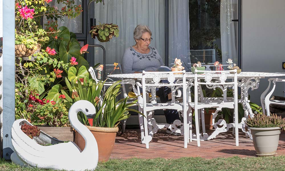 Retired Life Right holder sitting on their patio