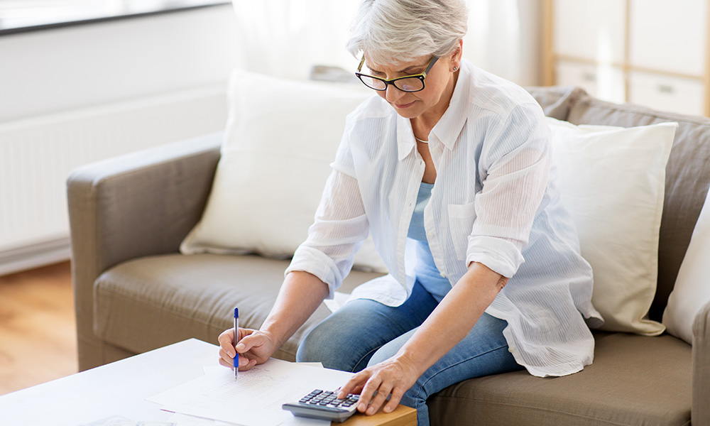 Retired person budgeting their pension